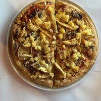 Vegan parmesan, chicken, pineapple, artichoke, onion & sun-dried tomato. at Ottimo Ristorante Italiano in Hobart