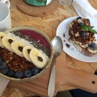Acai bowl & energy tartine - both delicious! at Paper Plane in Nice