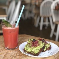 Avo on toast and watermelon juice  at Paper Plane in Nice
