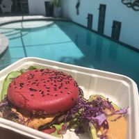 Vegan house made burger with beet bun at Organically Twisted in Naples
