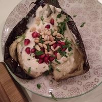 Eggplant with tahini, pinenuts and pomegranate seeds at D&A Hummus Bistro - Westerstraat in Amsterdam