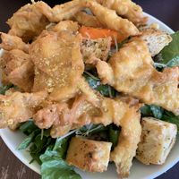House Caesar with croutons and oyster mushroom fritters  at Veg Cafe in Sacramento