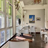 Part of the enclosed porch seating area  at Veg Cafe in Sacramento