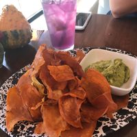 Sweet potato chips n ginger Guac. Tasty! at Veg Cafe in Sacramento