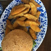 Beyond burger with potato wedges at Veg Cafe in Sacramento
