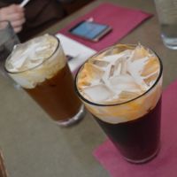 Thai tea (roiboos, red tea) and coffe. Both with ice and coconut milk (instad of the regular condensed milk. Included in the menu of the day at Thai Basil Restaurant in Sacramento