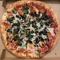 Large pie with vegan cheese, vegan pepperoni, black olive, & spinach 💚 at Pizza Classics in San Antonio