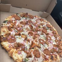 Vegan pepperoni and sausage, onion, and spinach   at Pizza Classics in San Antonio