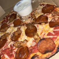 Gluten free crust. Vegan pepperoni and sausage with vegan cheese    at Pizza Classics in San Antonio