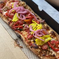 Vegan moz, vegan sausage, tomato’s, picked onions, banana peppers  at IAD - &pizza - CC in Dulles