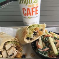 Caribbean Jerk Chicken Wrap  •vegan chicken •rice •black beans •roasted pineapple salsa •romaine •jerk sauce •Kale & Apple Slaw at Tropical Smoothie Cafe in Fort Myers