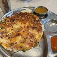Vegetable uttapam with vegan sambhar and chutneys  at Chennai Srilalitha in North West London
