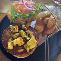 Bbq and pineapple falafel burger with extra grilled banana peppers   at Cafe Mono Congo in Dominical