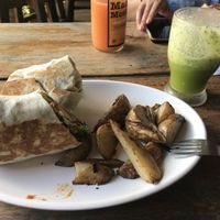 Falafel and hummus wrap with a kale and piña refresher  at Cafe Mono Congo in Dominical