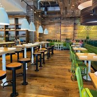 Beautiful interior, open space with lots of seating  at True Food Kitchen in El Segundo