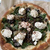 Spinach mushroom pizza with almond ricotta   at True Food Kitchen in El Segundo