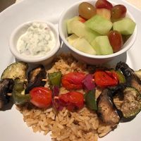 Veggie Kabobs over rice plus side of fresh fruit at Zoës Kitchen in Bluffton