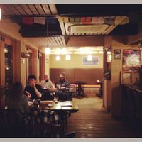 The dining area has an amazing view of the river at Om Ganeza in Gero