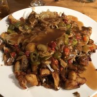 Extra large build your own poutine at Poutineville in Quebec