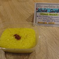 Schole Sard, a Persian vegan rice pudding with saffron, rose water, alnonds, and sugar at Philo Cafe in Saarbrucken