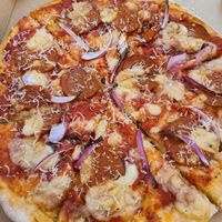 Pepperoni pizza  at Half-Peach Bakery & Cafe in Louisville