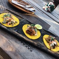trio.. soyrizo & cheese, porkless cracklings, and creamy poblanos  at Charly's Vegan Tacos - Food Truck in Tulum
