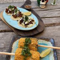 Taco sampler and elote at Charly's Vegan Tacos - Food Truck in Tulum