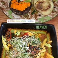 Noodle dish and burger  at Curcuma in El Chalten