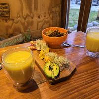 Appetizer and beverage at Curcuma in El Chalten