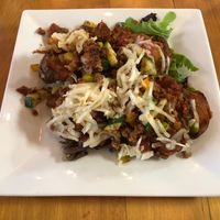 Crispy Potatoes topped with Marinara, Pizza Supreme Mix and Mozzarella. 😋  at Root in Lancaster