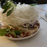 Beetroot with green beans, hazelnuts and crispy rice noodles. The rice thingy was put on the plate so inpractically, I had no idea how to eat it. Nonetheless, delicious.  at Kohvik Must Puudel in Tallinn