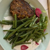 Main dish - quinoa patties. Really soooooo delicious!  at Kohvik Must Puudel in Tallinn