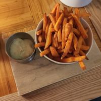 Sweet Potatoe fries with Vegan herbal majo at Kohvik Must Puudel in Tallinn