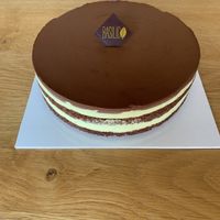 Torta con crema chantilly e ganache di cioccolata   at Basilico Food - Via Massarenti in Bologna