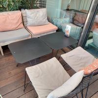 Lounge with low chairs/tables at Hiltl - Dachterrasse in Zurich