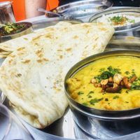 Korma and garlic naan at Spice Box in East London