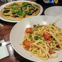 Absolutely delicious! Vegan creamy fettuccine and mushroom pizza! at Farelli's Trattoria in Queenstown