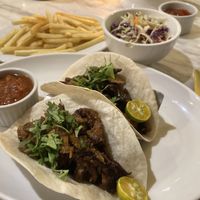 Seitan taco with side of fries and coleslaw  at Green Bar in Makati
