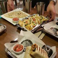 Cheesy mac burrito's and vegan nachos!!!! at Green Bar in Makati