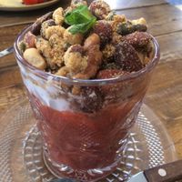 strawberry and rhubarb with coconut yogurt and mixed nuts and seeds at By Lima in Haarlem