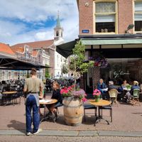 Large outdoor seating area at By Lima in Haarlem