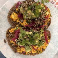 No egg egg salad sandwich with avocado and pickled onions  at By Lima in Haarlem