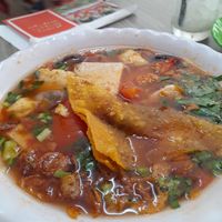 Soup with a tomato broth at Quan Chay 103 in Ho Chi Minh City