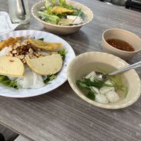 Bánh cuốn with soup on the side and noodle soup.   at Quan Chay 103 in Ho Chi Minh City