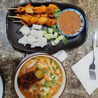 Sarawak laska and satay at The Black Cat Cafe in Kuala Lumpur