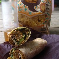 Excellent falafel wrap filled with veggies, kombucha and tortilla chips. at Amarante Epicerie Ecologique in Temiscouata-sur-le-lac