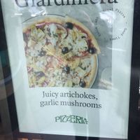 Vegan Pizza advertised in the window!  at Pizza Express in Reigate