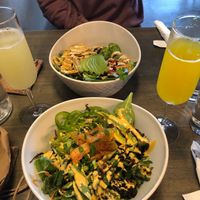 Taco bowl (top) Bibimbap bowl (bottom) with cold-pressed mimosas  at The Sanctum Cafe in Orlando