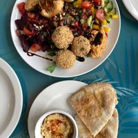 Mixed mezze platter for two with pitta bread and hummus  at Poco Culina in Cheltenham