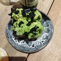 My picture skills are so sad. This one was delicious with zucchini outerior and a huge avocado creme pile on top at Youmiko Vegan Sushi - Hoża in Warsaw
